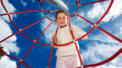 A young girl all smiles at a local recreational facility