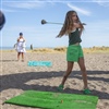 Indi Mae Dserasis-Colhoun tries her hand at golf at the Greystones Beach Festival, South beach, Greystones. Photo Credit: Mick Kelly