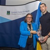 Cathaoirleach of Wicklow County Council Cllr. Dr. Caroline Winstanley makes a presentation to Wicklow's Tailteann cup winner Padraig O'Toole
