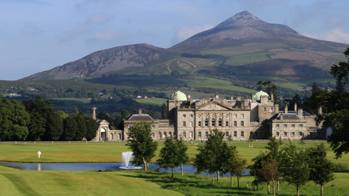 Photo of a majestic castle from afar which now is used as a luxury hotel